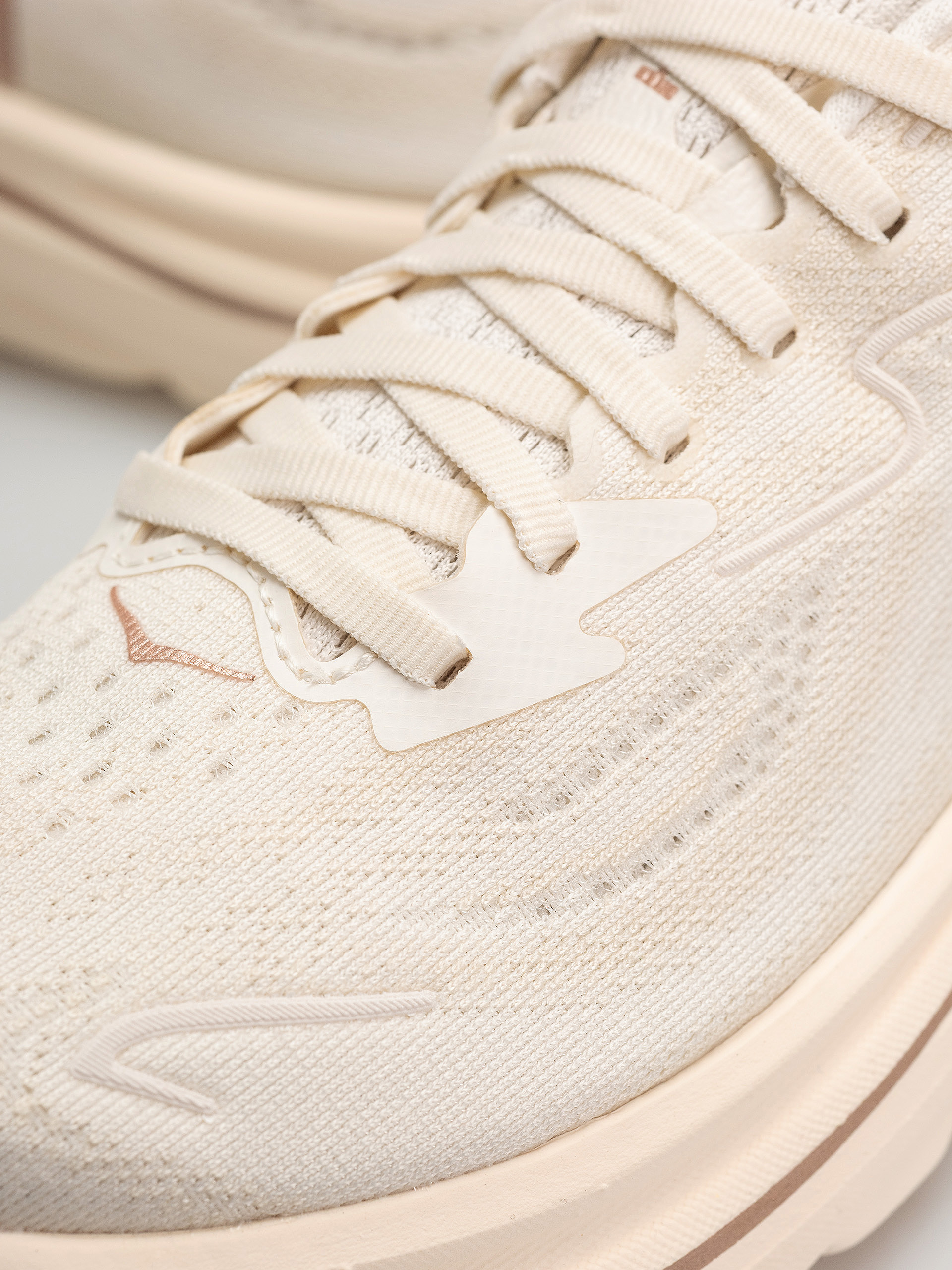 Hoka Clifton 10 Wmn Schuhe (alabaster/rose gold)