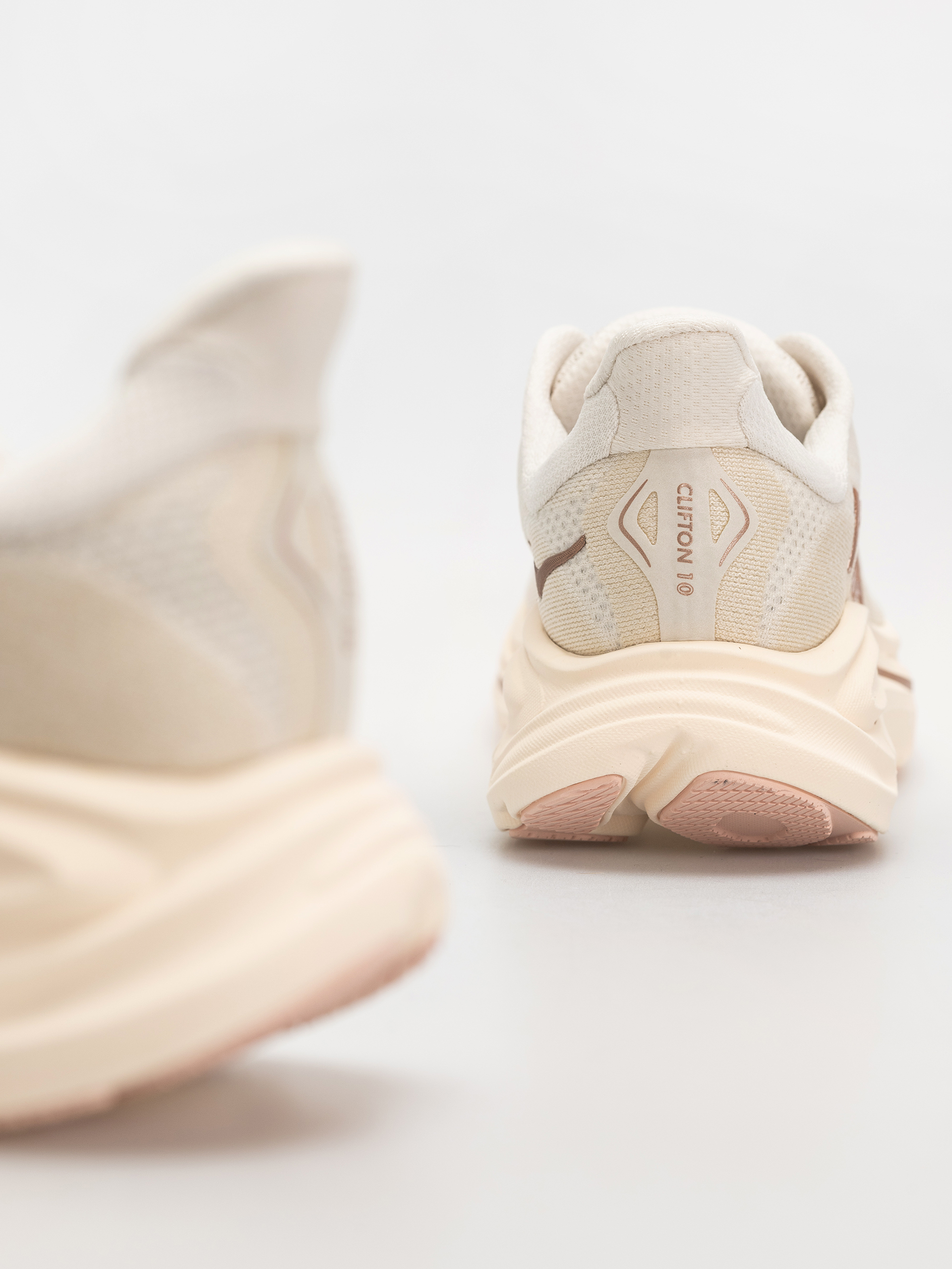 Hoka Clifton 10 Wmn Shoes (alabaster/rose gold)