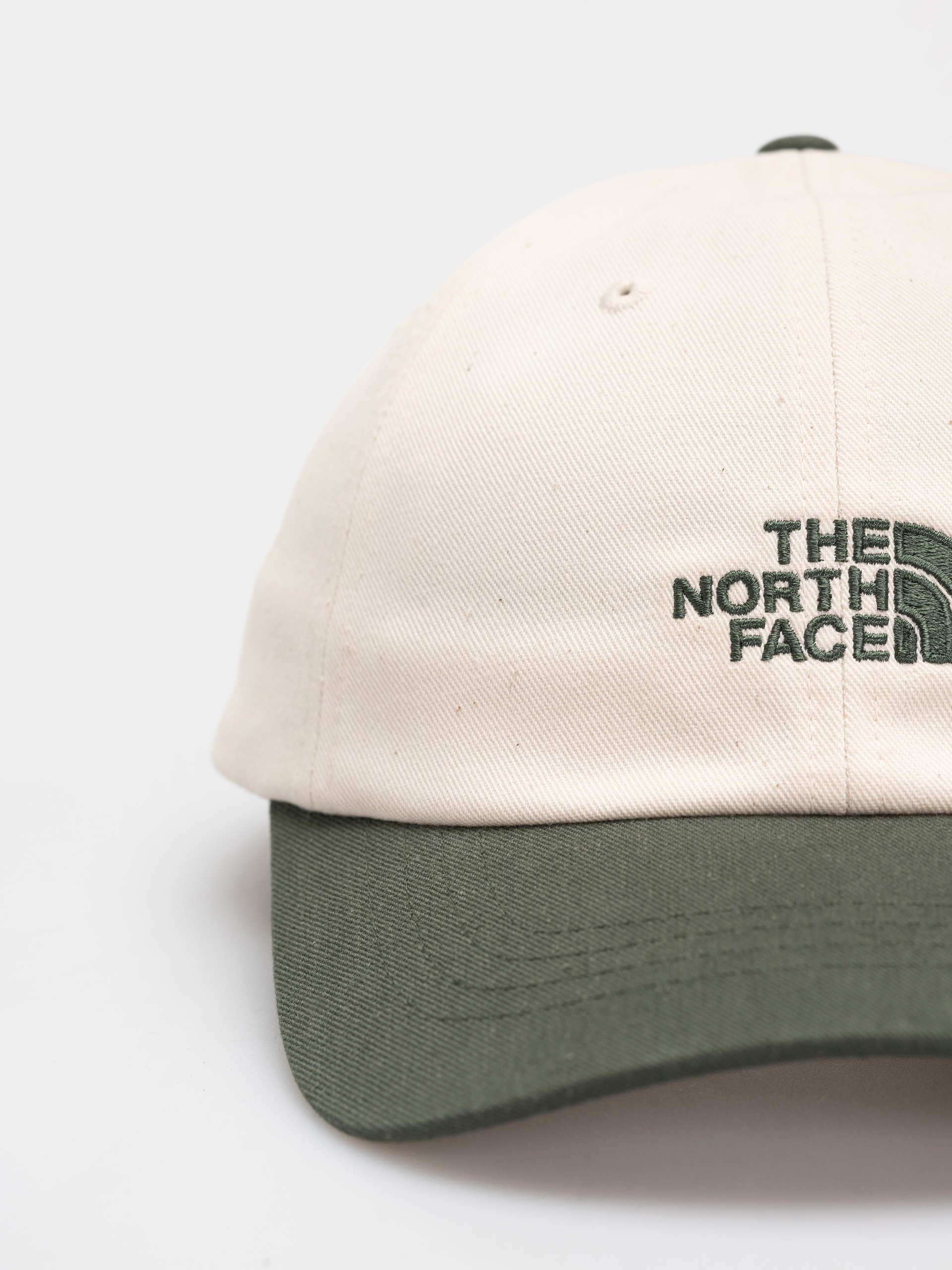 The North Face Norm Cap (bottle green/white dune)
