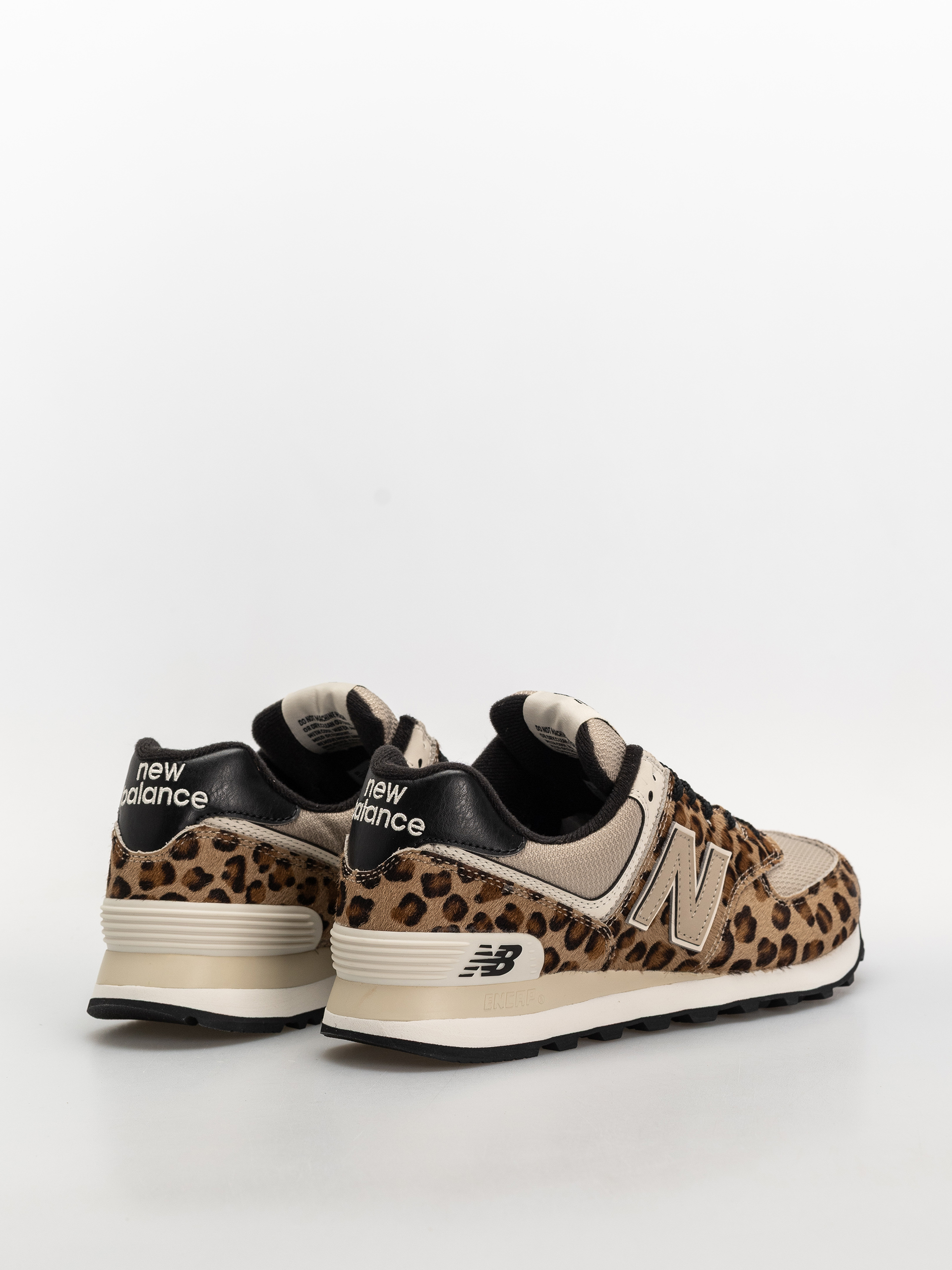 New Balance 574 Wmn Schuhe (stoneware/linen/black)