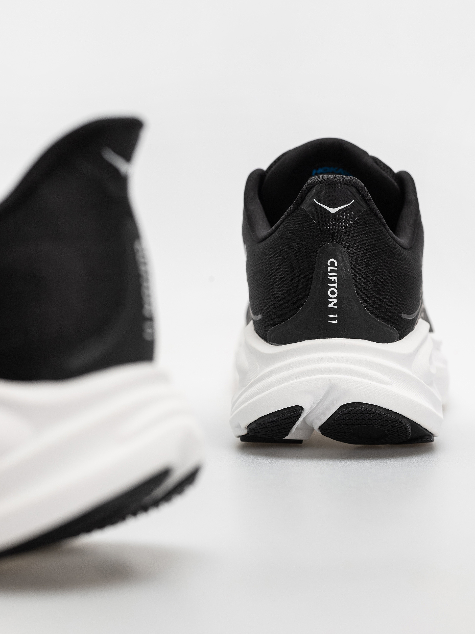 Hoka Clifton 11 Schuhe (black/white)
