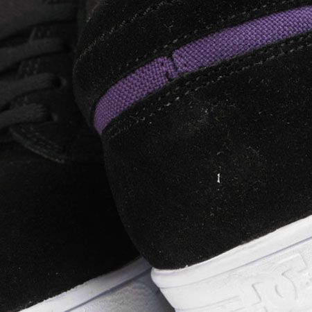 black and purple dc shoes
