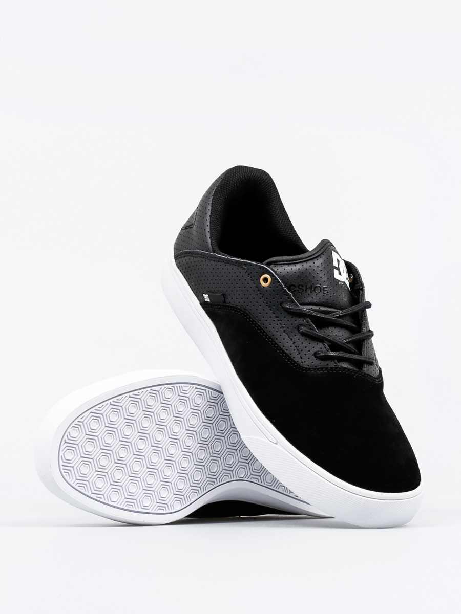 black and gold dc shoes