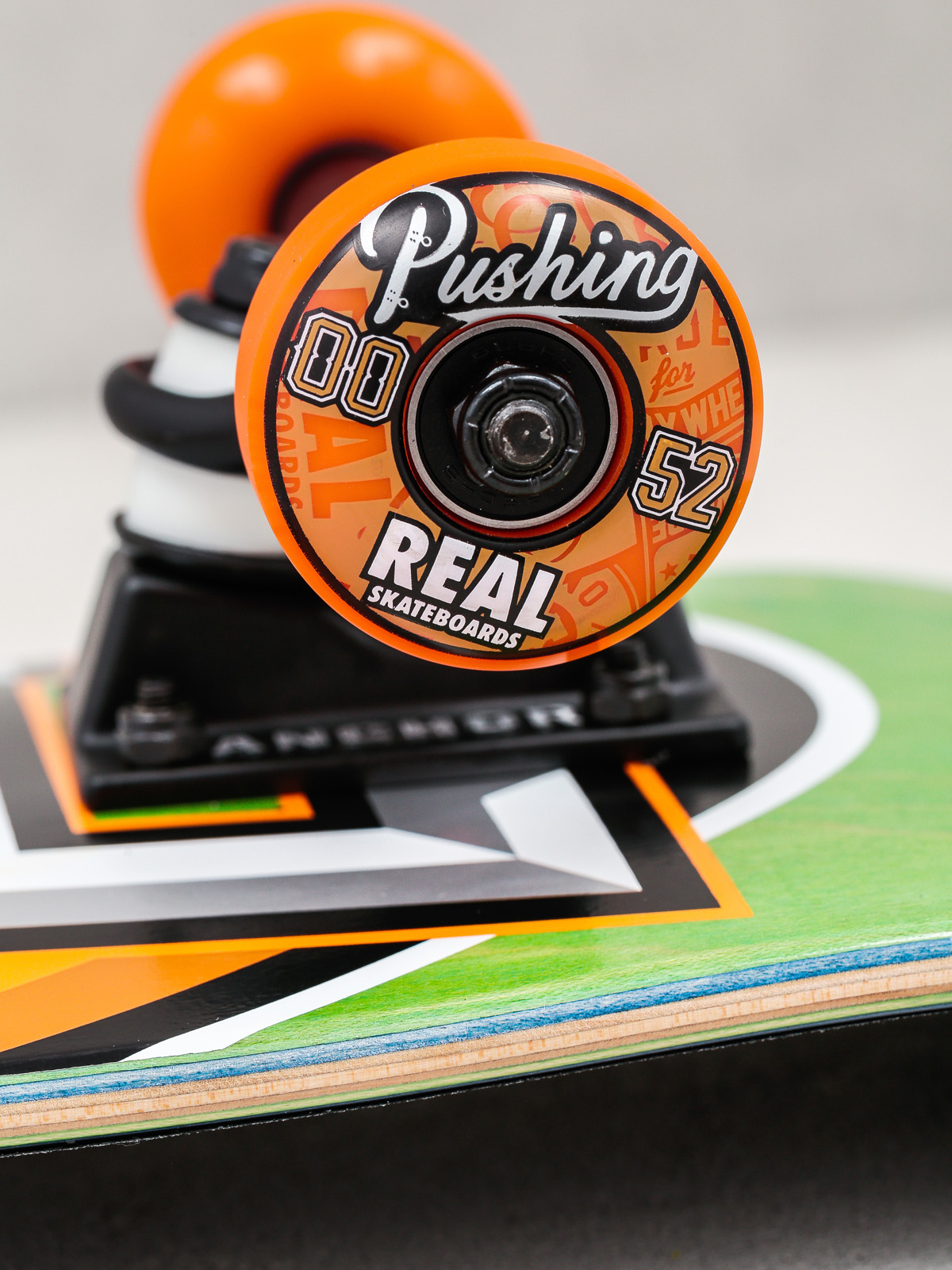 Real Skateboard Alumni Small (green/orange)