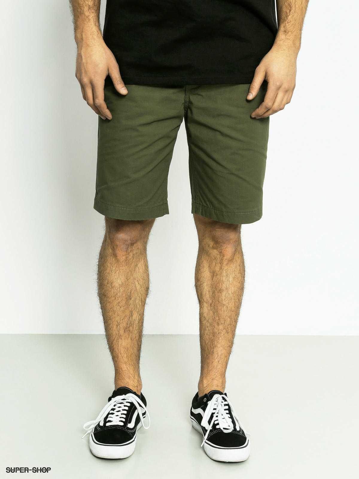 green levi shorts