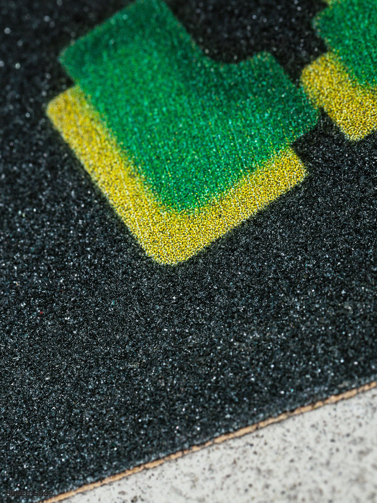 https://static.super-shop.com/846455-shake-junt-grip-tape-sprayed-green-yellow.jpg?w=1920