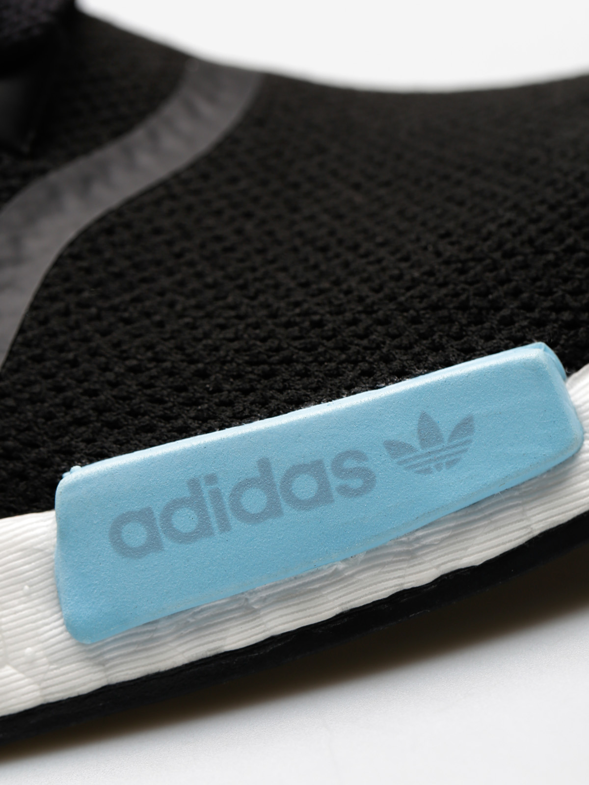 nmd r1 black icey blue