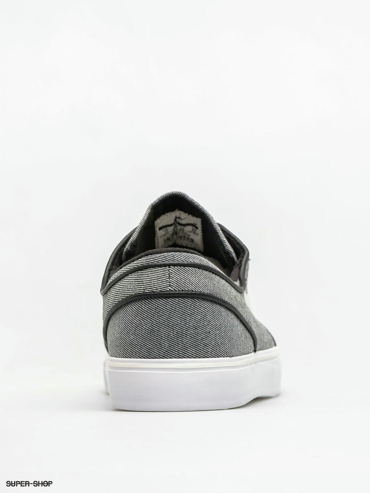 sb janoski black sail  and  white canvas skate shoes
