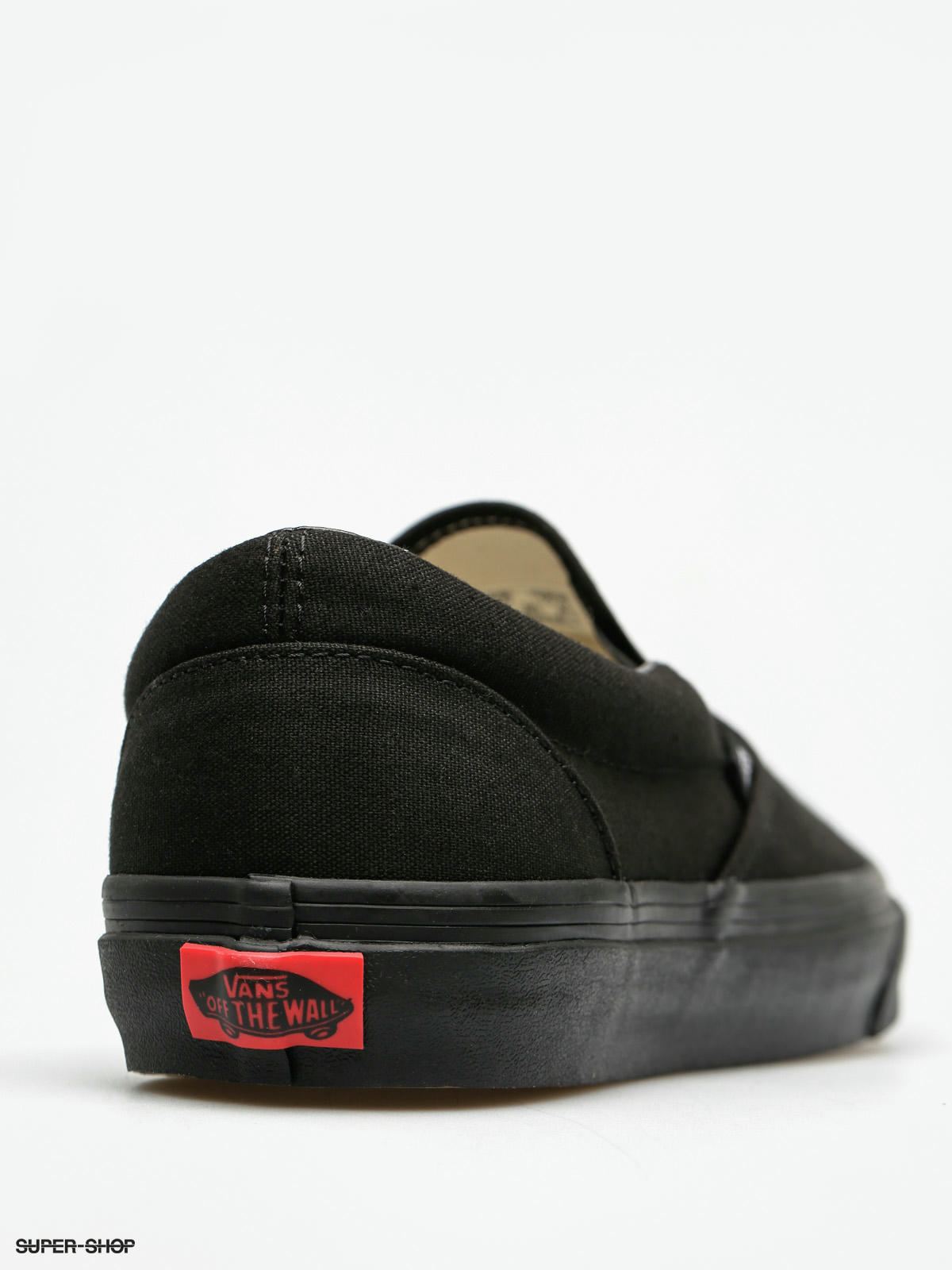 vans triple black slip on