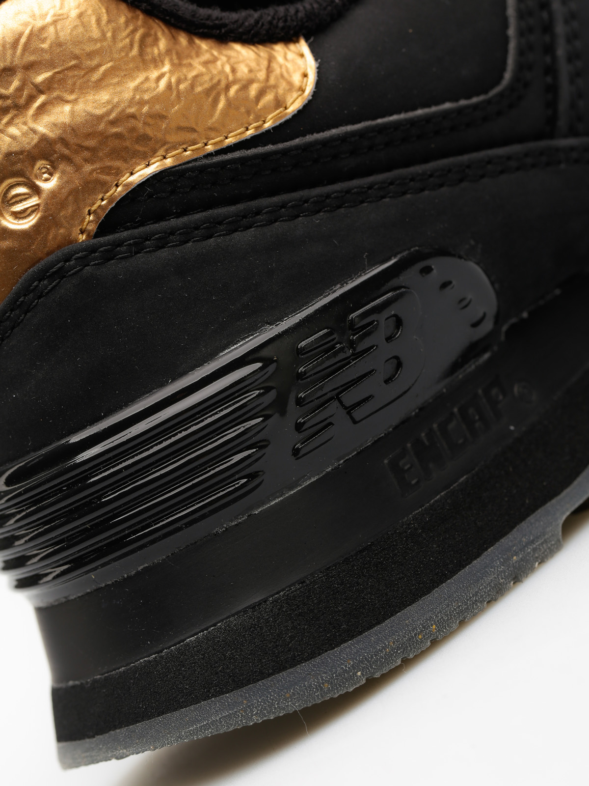 New Balance Shoes 574 Wmn (black/gold)