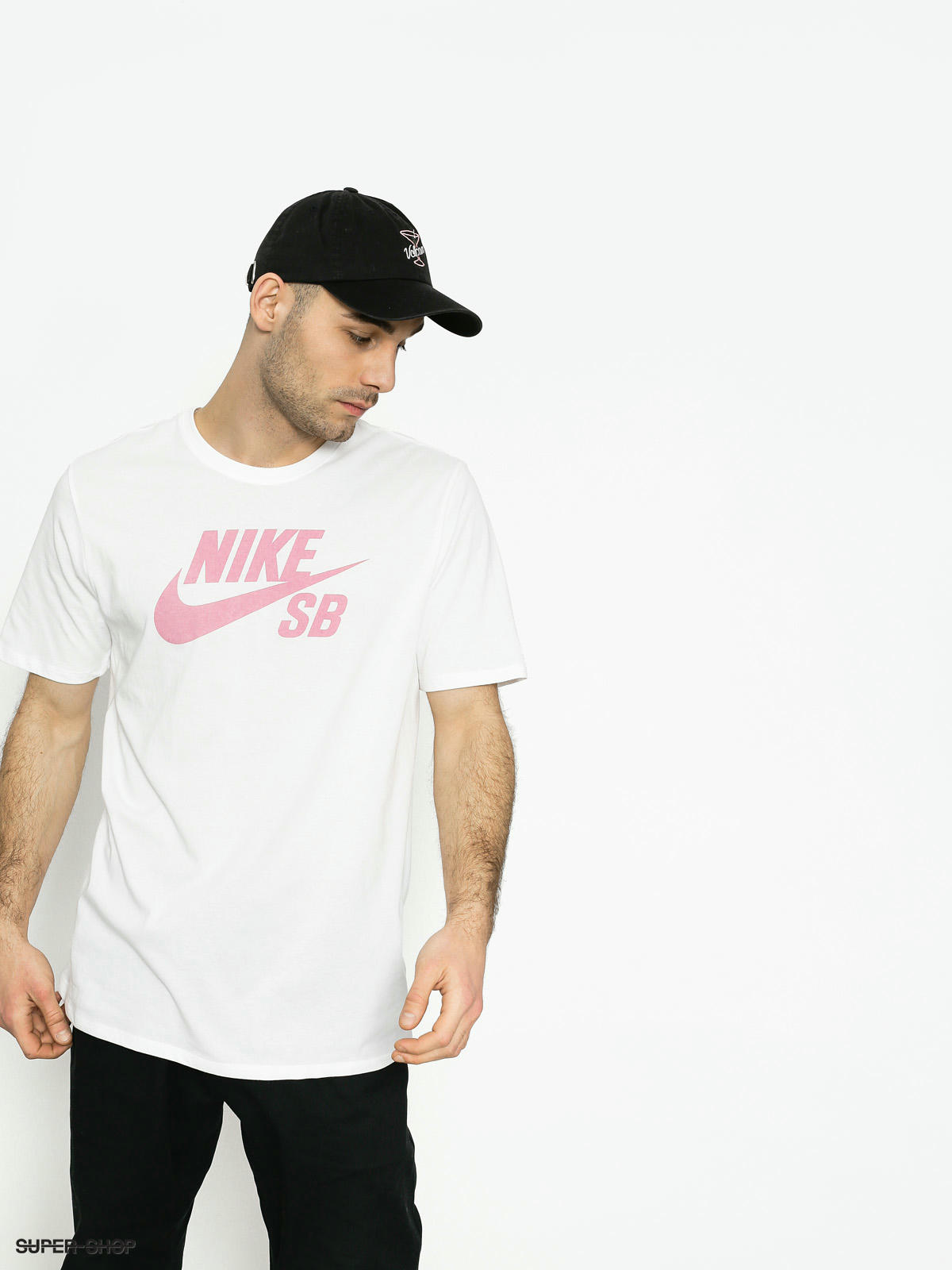 white nike shirt with pink logo