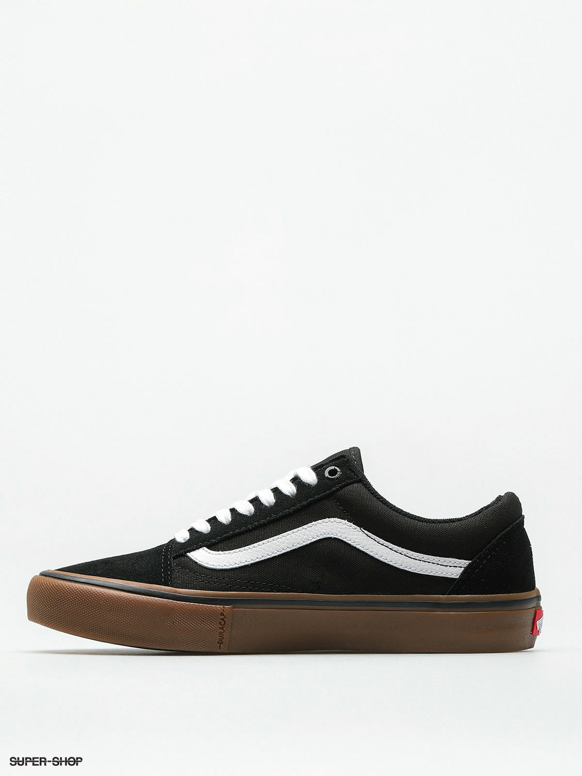 Black and white store vans gum sole