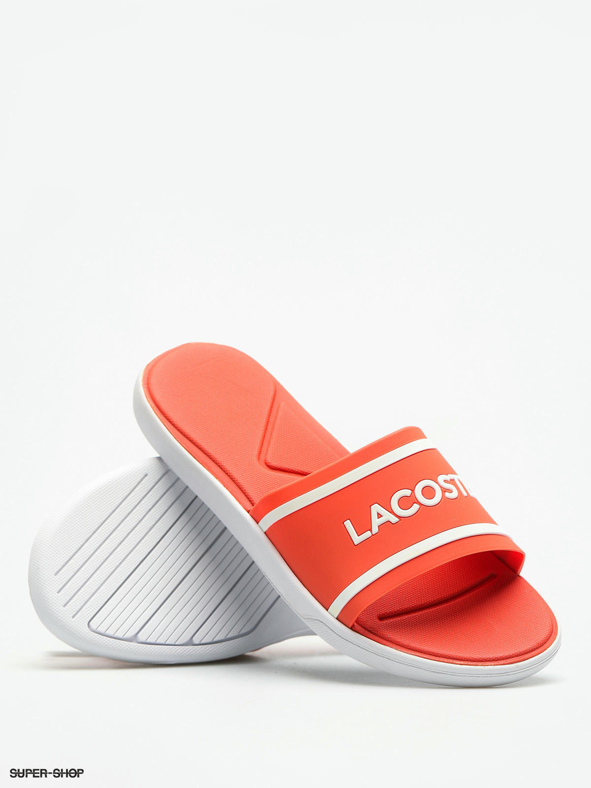 white lacoste slides