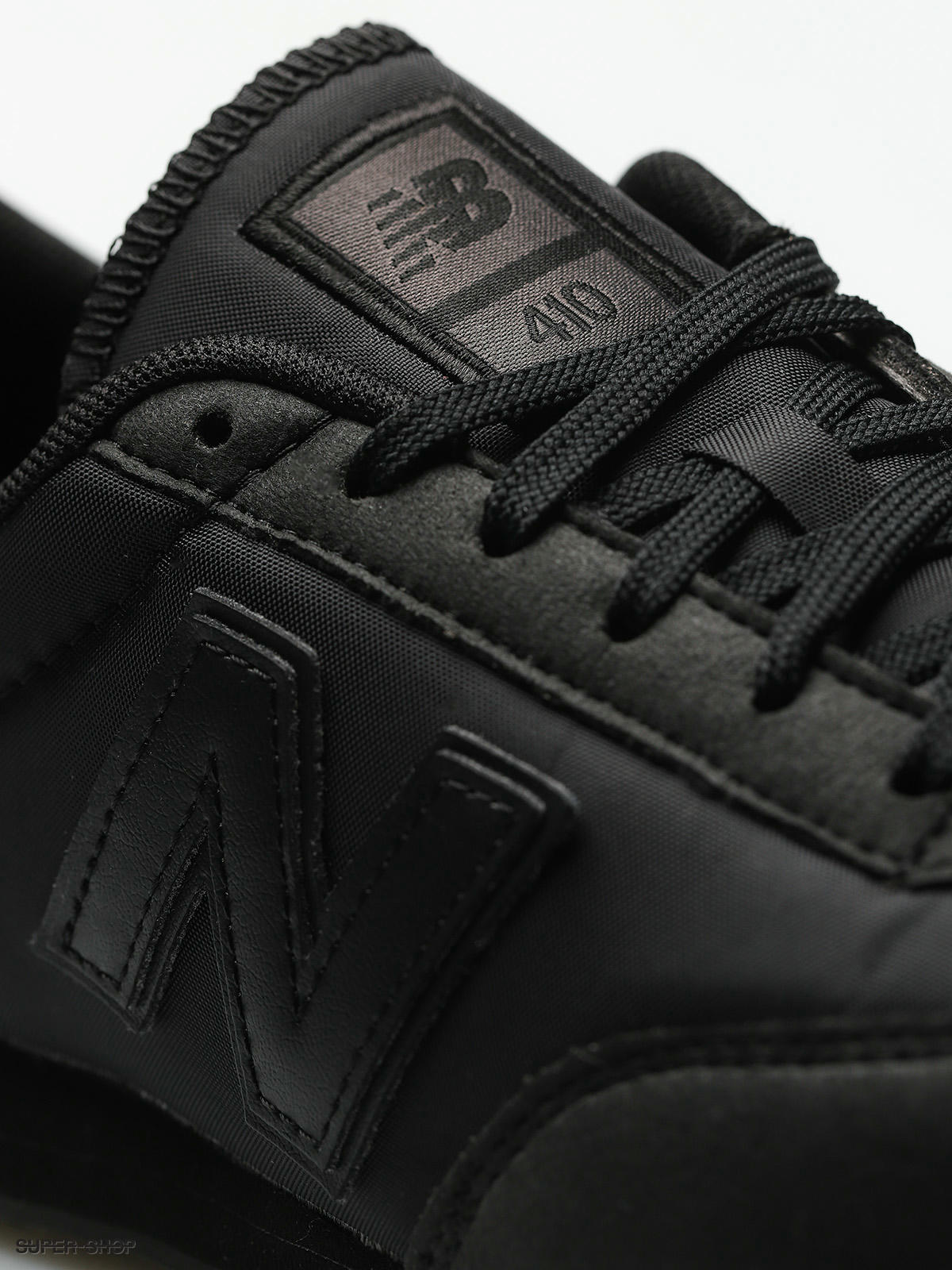 New balance 410 outlet black leather