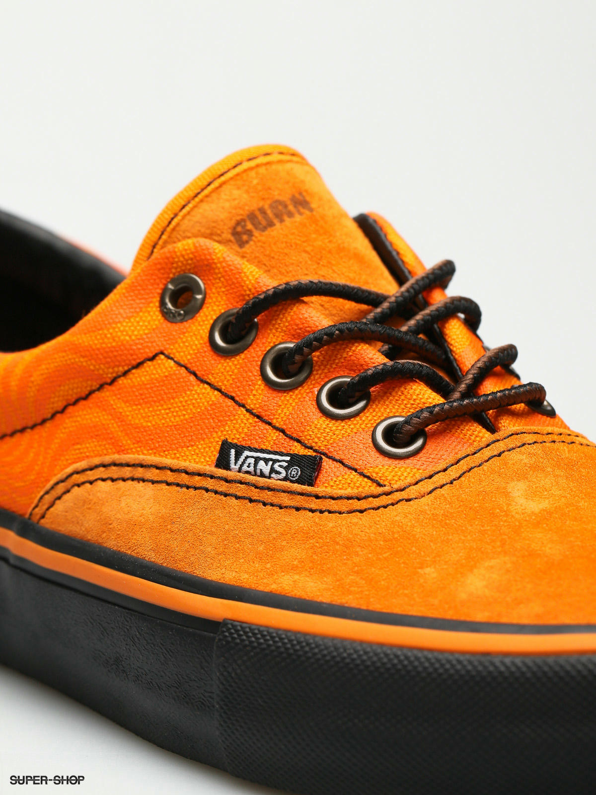 orange spitfire vans