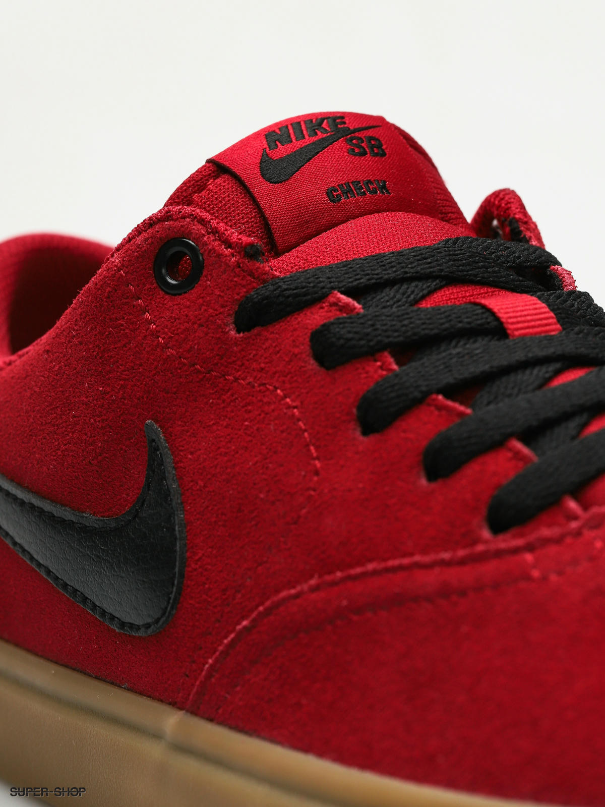 nike sb red check solarsoft trainers