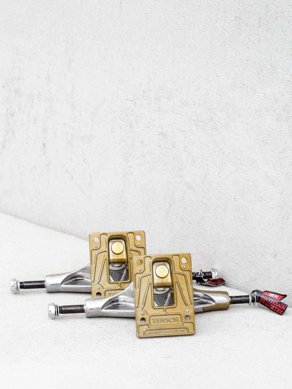 Tensor Alum Primo Trucks (raw/gold)